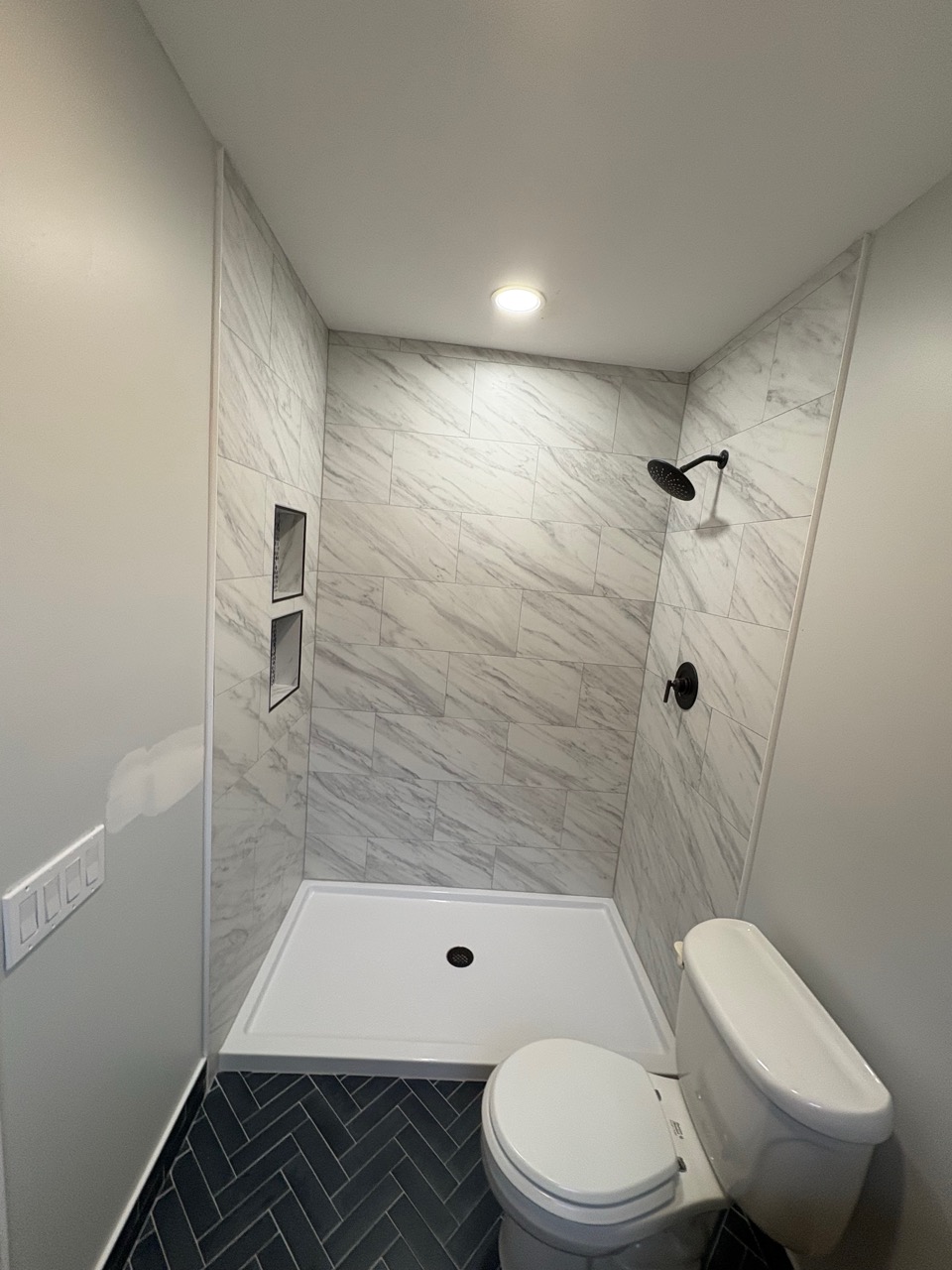 Bathroom remodel with upgraded sink, mirror, and lighting